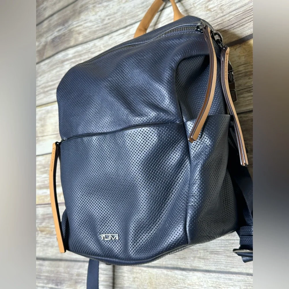 Tumi Navy Perforated Leather Backpack with Tan Handles